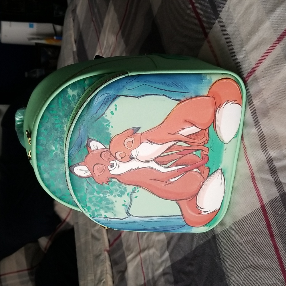 Loungefly Disney Fox and the Hound Todd Vixey backpack bag.